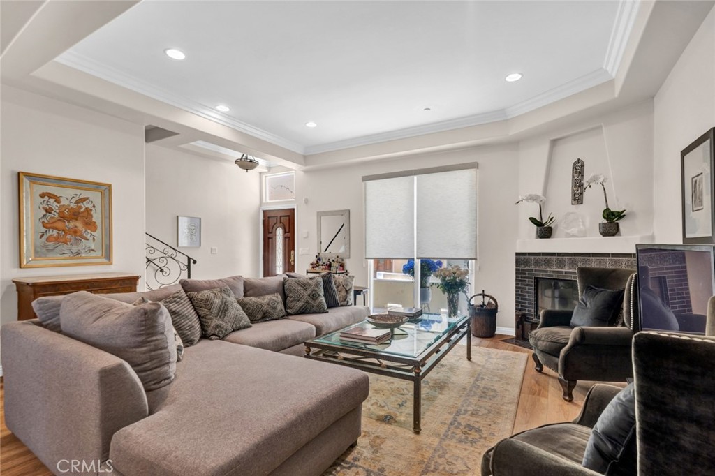 Experience the warmth and comfort of true home living in this beautifully updated townhouse! The expansive open-concept living and dining area is perfect for entertaining, featuring brand-new flooring and a stunningly remodeled gas fireplace. The oversized gourmet kitchen is a chef’s dream, complete with granite countertops, stainless steel appliances, and a newly added island for extra prep and seating space. Upstairs, the charming primary suite offers a peaceful retreat with vaulted ceilings, dual walk-in closets featuring custom built-ins, and a luxurious en-suite bathroom with double sinks and an oversized walk-in shower. Two additional spacious bedrooms share a remodeled full bath with a soaking tub. Downstairs, discover a generous bonus room ideal for a home office, gym, or creative studio—right next to the private two-car side-by-side garage with direct unit access. And don’t miss the crown jewel: a private rooftop deck with serene mountain views, now conveniently plumbed for your rooftop garden or greenery. This turnkey townhouse blends style, comfort, and convenience in every detail—come fall in love!