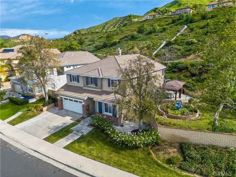 Photo of 29062 Garnet Canyon Dr, Saugus, CA 91390 (MLS # WS26025407)