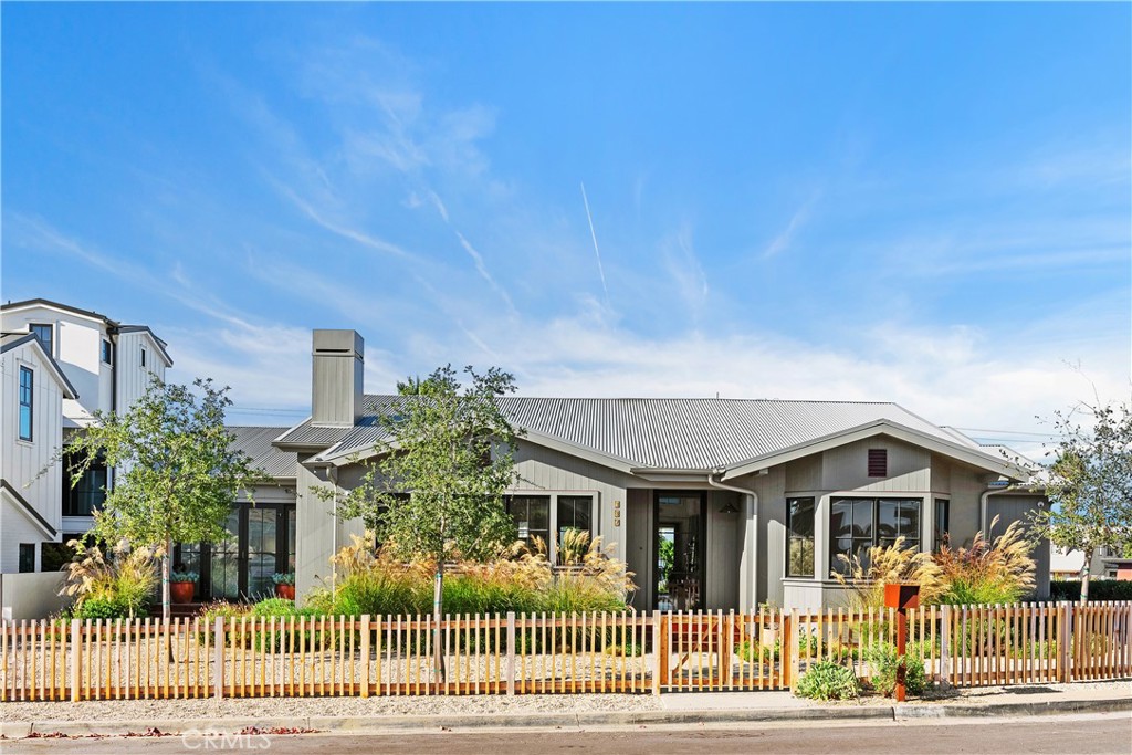 Presenting a magnificent newly-built, single-story modern farmhouse in the sought-after Newport Heights neighborhood. Experience a harmonious blend of comfort and luxury, with only a short stroll to the water’s edge in Newport Harbor. Situated on a Rare 6,200 SF Corner Lot, with 4 spacious bedrooms, the open floor plan with high ceilings welcomes a flood of natural light, highlighting the beautiful custom finishes of this amazing coastal retreat. The appeal of this contemporary home begins immediately as you approach – with the charm of a low-gated pathway leading you through Sonoma-style custom landscaping to the entry door. The seamlessly connected great room, kitchen and dining area framed with large windows and pocket doors to the backyard, create the perfect opportunity for entertaining. The open-concept kitchen is the heart of the home, centered with an island with a seating ledge, gorgeous counter tops, Zellige tile backsplash, impressive floor-to-ceiling custom cabinetry with designer hardware, and completed with high-end appliances. The Primary Suite provides ample space and an elegant spa-like bath with floating dual-sink cabinets, floor-to-ceiling tiled shower with dual shower heads enclosed by glass. The thoughtfully-designed floor plan features stunning upgrades and craftsmanship by local design-build firm Clayton Builders throughout including wide-plank European Oak flooring, custom base-boards, recessed lighting, sound system, designer tiling, and more. Your guests will enjoy countless memories in your custom-designed backyard with a built-in BBQ and refrigerator, deck, and central firepit for many gatherings in So Cal’s ideal year-round climate. Experience the wide-variety of outdoor and water activities, including sailing, boating, paddle-boarding, and swimming and surfing with the Newport Harbor and the Balboa Peninsula just a few blocks away. You will enjoy convenient access to waterfront cafes, upscale boutique stores, fine dining, art galleries, and Lido Village, as well as nearby Newport Beach proper, Fashion Island, award-winning schools, Hoag Hospital, and the very finest for your Newport Beach lifestyle