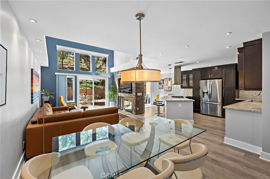 This property at 29405 Christiana Way continues to impress with its modern design updates. In addition to its spacious 2-bedroom-plus-loft layout and upscale finishes, the home has been enhanced with several contemporary touches. As you enter the home you notice all the natural light and the beautiful stack stone fireplace. Modern Recess lighting provides ambiance in the evening.

The loft features glass walls paired with stainless steel elements, creating a bright and airy feel that aligns with modern design trends.

This home has luxurious vinyl plank flooring.  The kitchen is a cook's dream, offering a large island, seating for 6, perfect for cooking and entertaining guests. Kitchen also offers stainless steel appliances and a cooktop. There is inviting outdoor spaces like the upstairs private balcony and upgraded paver patio area. This property offers both comfort and style in a highly desirable location at Niguel Summit in the Jamaica Community of Laguna Niguel.

The spacious 2 car garage has epoxy floors and plenty of storage. 

This Community offers easy access to the Aliso Summit Hiking Trail with it's beautiful views of the Ocean and Surrounding Hills. Community Pool and Spa provide outdoor enjoyment year around.  Dana Point Harbor and Laguna Beach are close by for dining and beach lovers.