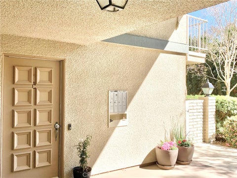 Photo of 897 Ronda Sevilla C, Laguna Woods, CA 92637 (MLS # OC26055529)