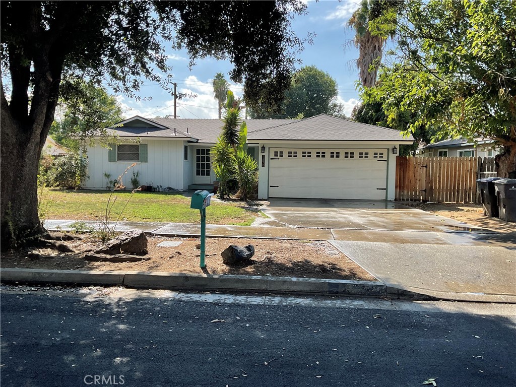 Welcome to this beautiful 3 bedroom 2 bath home with an attached 2 car garage in the lovely city of Riverside! Nestled in a tree lined neighborhood, this home is minutes away from a variety of amenities, close to the 91 freeway, Madison Elementary and Ramona High School.! This spacious home has an added 414 sq. ft. patio that can be versatile in many ways. It has been updated with fresh paint, newer floors, updated kitchen and bathrooms, ceiling fans are in each of the bedrooms and lots of closet space. The backyard has planters ready for vegetables and plenty of space to play fetch with your furry friend!