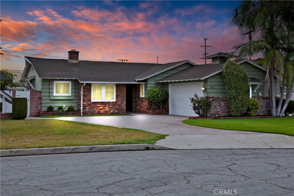 Welcome to this charming mid-century ranch-style home in prime Northeast Downey! Nestled in a quiet, sought-after neighborhood, this quaint 3-bedroom, 2.5-bathroom home offers timeless character and incredible potential. Featuring quality laminate wood flooring throughout, travertine tile in two bathrooms, and indoor laundry, this home reflects true pride of ownership. The spacious layout is ideal for comfortable living and entertaining, complete with a Pebble Tec pool and a low-maintenance yard. A newer central HVAC system ensures year-round comfort. Located just minutes from shopping, award-winning elementary, middle, and high schools, and with easy access to the 605 and 5 freeways, convenience is at your doorstep. Whether you're looking to move right in or update to your taste, this is a fantastic opportunity to make this home your own in one of Downey's most desirable areas!