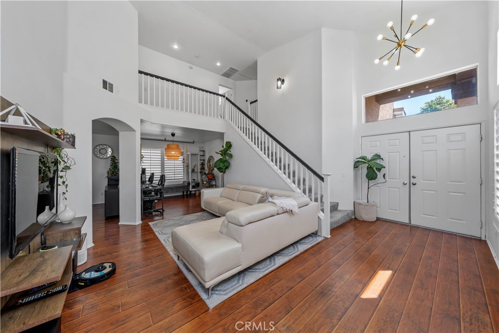 Welcome to this beautifully maintained 3-bedroom, 2.5-bath single-family home located in the highly desirable South Corona neighborhood. This move-in ready home features granite countertops, dual pane windows, newer interior paint, and custom white shutters throughout. The bright and open layout includes beautiful flooring, plenty of windows for natural light, and a cozy fireplace in the family room. All bathrooms have been recently renovated. Enjoy peaceful mountain views and complete with brand new vinyl fencing. Additional highlights include a durable tile roof and an attached 2-car garage. Conveniently located near Sam’s Club, Home Depot, and Santana Regional Park, with easy access to the 91 & 15 freeways and top-rated Corona-Norco schools. A must-see home in a prime location!