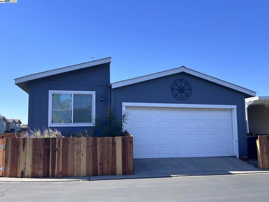 Don’t miss this exceptional opportunity to own a beautifully maintained, move-in-ready mobile home located in a desirable all-age community. Designed with a single-family style setting, this home features two spacious bedrooms and two full bathrooms, providing comfort and functionality for modern living. Recent updates include a brand-new fence and railing, enhancing both curb appeal and value. Enjoy a private front yard and side yard—ideal for gardening, outdoor dining, or relaxing with family and friends. The property also offers a rare two-car garage plus additional parking in the front yard, providing ample space for residents and guests. With a low space rent and a welcoming neighborhood atmosphere, this home presents an affordable yet high-quality living option. Move in and experience the perfect balance of comfort, style, and convenience. Fireplaces: NO