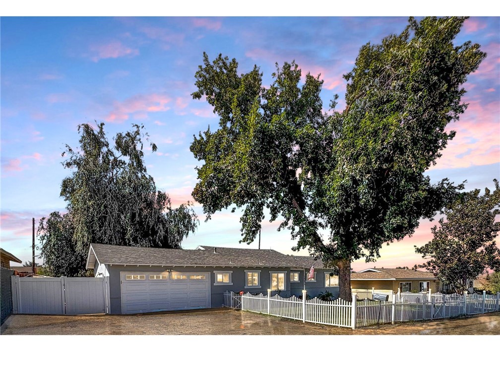 Cute 3 bedroom + 2 bath Yucaipa home in a quiet neighborhood on large 1/4 acre lot! This wonderful home has very nice curb appeal with a nice sized front yard with automatic sprinklers, large shade tree and a white picket fence! Freshly painted exterior, newer roof, newer windows, remodeled kitchen with quartz countertops, full tile backsplash, stainless steel appliances, upgraded master bathroom, tile showers in both bathrooms, central air and heat, covered patio and an attached 2 car garage! This home sits on a large pool sized lot, room for rv parking, entertaining, etc.! Very private street. Close to all amenities, shopping, restaurants and only 1 mile from freeway exit Live Oak Canyon Rd. Make this home yours before it's too late! Contact agent for financing incentives and a quick closing!
Call for your private showing today!