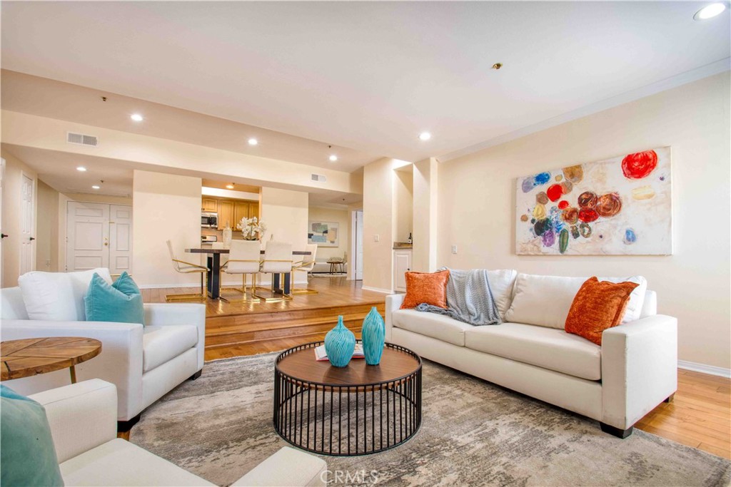 Welcome to this beautifully appointed residence offering over 1,800 sq. ft. of bright, open-concept living. Designed for both comfort and versatility, the home features a step-down living room with a cozy fireplace—perfect for relaxing or entertaining. A thoughtfully designed split-bedroom layout provides privacy and convenience, with both oversized bedrooms offering en suite baths and generous walk-in closets.
The kitchen boasts granite countertops and stainless steel fixtures, flowing seamlessly into flexible living areas—including two bonus rooms ideal for a home office, den, formal dining, playroom, gym, or whatever best suits your lifestyle.
Additional highlights include hardwood floors throughout, expansive windows that fill the space with natural light, abundant storage, an in-unit washer and dryer, and gated tandem parking.
All this in an unbeatable location—just moments from Brentwood’s premier shopping, dining, and easy freeway access. A perfect blend of luxury, location, and opportunity. Check out the virtual tour.