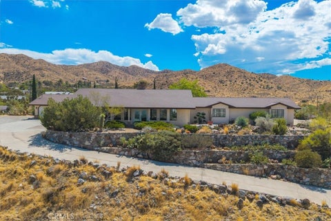 Photo of 56583 Free Gold Drive, Yucca Valley, CA 92284 (MLS # JT26200166)