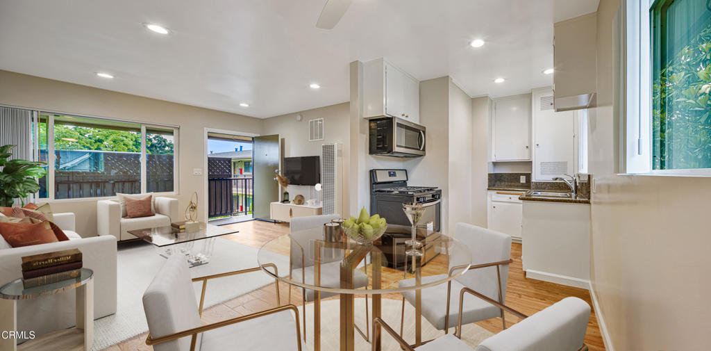 Gorgeous updated top floor residence located in this highly sought after Mid-Century style gated building with patio. This top floor corner unit has an abundance of large windows that fill the home with great natural light and views of the lush green courtyard. The updated kitchen offers mountain views, quartz countertops, new gas range/oven, large microwave, garbage disposal and an ample amount of new cabinetry with a pantry. In addition, this residence features new premium laminate floors, freshly painted interior, beautiful ceiling fans, window blinds, custom closet, recessed lighting, new A/C unit with remote control, convenient USB charging outlets and is cable ready. The bathroom is updated with a new medicine cabinet, newly installed handheld shower head, ceiling fan/heater and new vanity. The bedroom features new custom mirror closet doors with plenty of closet space and built-in cabinets for additional storage. The mature lush landscaping and tall fencing enhances the privacy of this gated serene community. A gated parking space is included in the rent with a convenient remote-control entry. The on-site extra clean laundry room has easy phone pay app. The proximity of this home offers quick access to the metro/freeway and is conveniently located near South Lake & Old Town Pasadena shopping & dining district. Pet Friendly Community! Living room virtually staged