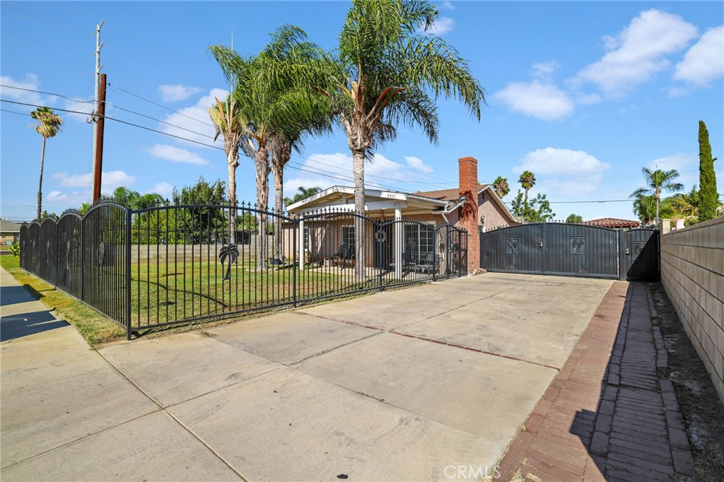 Turnkey Single-Story Home with Bonus Income! This updated home features a comfortable layout with a spacious living room, dining area, and open kitchen that flows seamlessly together. The property also includes a detached 2-bedroom, 1-bath living quarters currently bringing in $1,800 per month, making it perfect for extended family living or generating extra income to offset your mortgage. Enjoy a large private yard with a covered patio ideal for BBQs and gatherings, plus ample parking space for multiple vehicles, RVs, and toys. Located in a great neighborhood close to shopping, schools, parks, and entertainment—all within a growing community. This home is move-in ready and offers the perfect blend of comfort, convenience, and financial opportunity.
