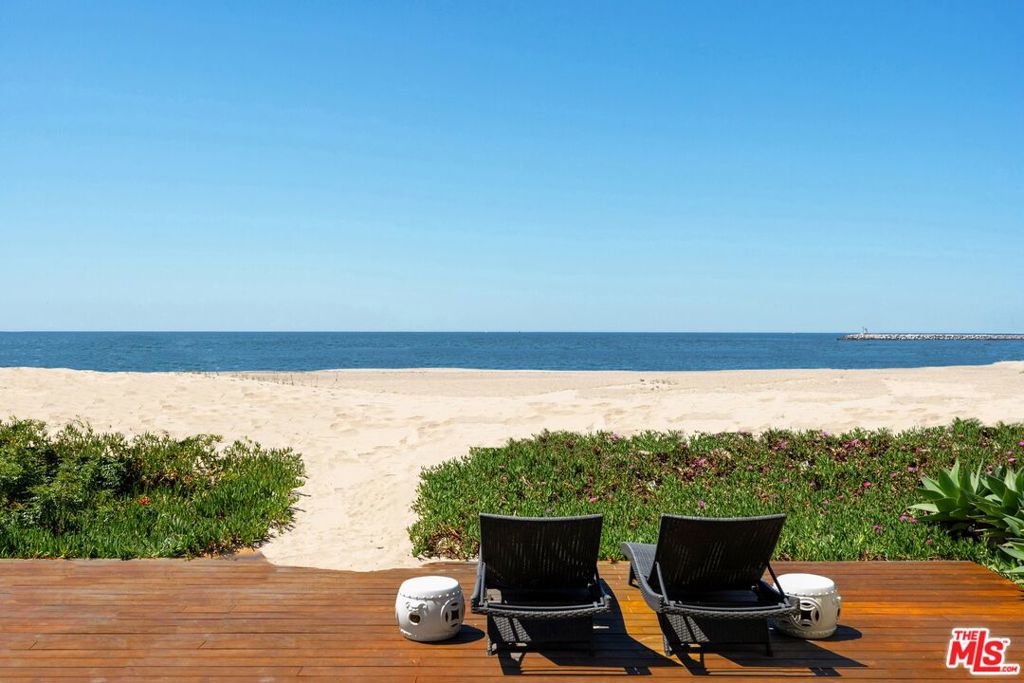 Step onto the sand and enjoy the ultimate in coveted beachfront living! Rare offering as the entire property will be delivered vacant at close of escrow. With direct access to the beach, showcasing unobstructed panoramic ocean views from Palos Verdes to Malibu, this meticulously remodeled, turnkey duplex is a once-in-a-lifetime opportunity to experience SoCal coastal living at its finest. Two airy and sun-filled units, completely upgraded with clean, modern aesthetics and open floor plan, feature designer fixtures, stainless-steel appliances, and bi-folding doors that slide away for seamless indoor-outdoor flow. Expansive lower deck with outdoor shower, perfect for beachside living and entertaining, extends out onto the beautiful wide stretch of white sand and beyond to the bicycle path and volleyball courts. Convenient proximity to acclaimed dining and shopping of downtown Playa del Rey, and to Silicon Beach, LAX, the Westside and Beach Cities. An exceptional slice of heaven for owner/user or as an investment property. 3 bed, 2 bath Top Unit & 2 bed, 2 bath Bottom Unit.