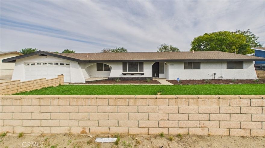 Welcome to 5726 Marlatt Street, Jurupa Valley, CA 91752! This charming single-story home, built in 1970, offers 1,891 square feet of comfortable living space on a generous 0.71-acre lot.



Step inside to discover a freshly painted interior and exterior, complemented by new laminate flooring throughout. The spacious family room invites you to relax, while the adjacent dining area provides a perfect setting for gatherings. The open kitchen and living room feature vaulted ceilings, a cozy fireplace, and a large sliding door that leads to the expansive backyard.



The master bedroom is a peaceful retreat with its own private bath, new vanity, and direct backyard access. Both bathrooms have been stylishly updated with brand new vanities and modern brushed nickel fixtures.



Outside, you’ll find a fully insulated detached three-car garage with its own electrical system, RV parking, and plenty of fruit trees and open space for equestrian use. This home truly has it all—space, style, and a peaceful setting to call your own.