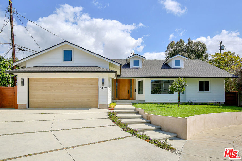 Transitional luxury living on a North Kentwood cul-de-sac, Westchester's most desirable neighborhood. This 3BR, 3.5BA, 2,266 sqft home on a 7,038 sqft lot was just completed with a fully custom interior remodel. The open floor plan extends to a spacious backyard with multiple decks for seamless indoor-outdoor living. High 9'-10' ceilings add light & volume, while the vaulted living room showcases custom cabinetry, floating shelves, and a sleek modern fireplace. The gourmet chef's kitchen features rift white oak cabinets, Thermador appliances, large pantry, and a waterfall island of imported stone. The primary suite offers vaulted ceilings, a large-walk-in closet, and an in-suite spa bathroom with double sinks, lighted touch mirrors, a natural stone shower, and an oversized soaking tub. Additional highlights include, attic space above the garage, surround sound & ethernet wiring, LED designer lighting, EV ready, alarm system, and much more. Near LMU, the golf course, the beach, Playa Vista and SoFi Stadium.