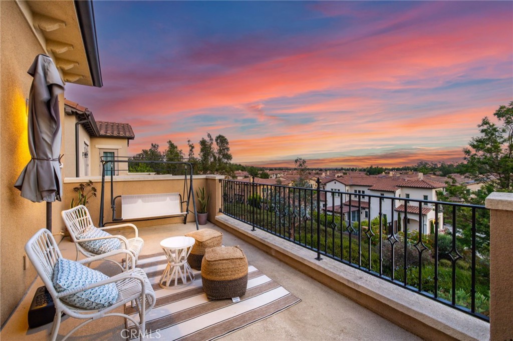 VIEW! VIEW! VIEW! Nestled in the exclusive gated community of The Groves at Orchard Hills, this stunning Capella Home boasts 4 bedroom, 4.5 bathroom, totaling 3,324 sqft of living space. Enjoy luxurious design & highly sought-after floorplan, with one bedroom on first level & 3 upstairs plus a loft. A gourmet master chef's kitchen featuring highly upgraded maple cabinets, stainless steel appliances, built-in refrigerator, wine cooler, a large high-end kitchen island with quartz counter top, and walk in pantry. Dining area opens to the spacious great room. Sliding glass door beautifully transitions this space to the California room and a low maintenance backyard where you either enjoy morning coffee or relax in the evening watching the amazing sunset or Disneyland firework. Updated wood flooring, window plantation shutters throughout. Huge master suite with spa-like bathroom & oversized balcony. Community amenities include: swimming pools and Jacuzzi, club house, BBQ, tennis courts and parks. Fabulous Orchard Hills Shopping Center and Award-winning Orchard Hills School are just minutes of a safe walk away. A Must See!
