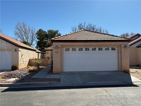 Photo of 11571 Park Ln, Apple Valley, CA 92308 (MLS # CV26086904)
