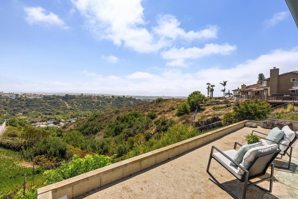 Midcentury modern home with spectacular and unobstructed panoramic bay and ocean views! Located in the Western Hills neighborhood, this Bay Park home is a blank canvas, ready for the next owner to make it their own. Step inside and be immediately captivated by the natural light and incredible views visible through the windows off the enclosed sunroom. The home has a great flow between the living room, kitchen, bedrooms, and bathrooms. SEE SUPPLEMENT The spacious deck and patio area with a shade pergola are perfect for entertaining and enjoying those incredible views--you can see USD, nightly SeaWorld fireworks, and all the way down the coast! Centrally located and set on a huge lot (nearly 9000 SF!), this property offers so much potential. Close to public transportation and community parks. Enjoy easy access to I-5, with shopping, dining, beaches, and downtown San Diego all within reach.