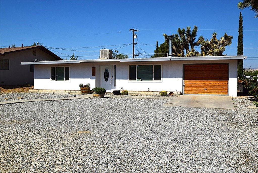 Step into modern comfort with this beautifully remodeled 2 bedroom, 1 bath home in Yucca Valley. Every detail has been thoughtfully upgraded, offering both style and functionality. Inside, the kitchen features stainless steel appliances and sleek finishes, while the home is equipped with zone control cooling and heating for year-round comfort. A separate laundry room, sewer hook-up for RV connection and many more upgrades add convenience and value to this move-in ready home. Enjoy a stunning landscaped front and back yard, perfect for relaxing or entertaining.
This is a perfect blend of charm and modern living—don’t miss the chance to make it yours!