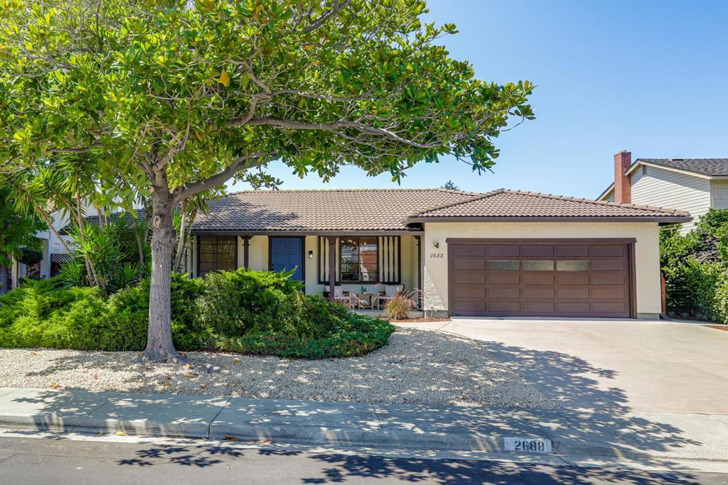 Welcome to this stunning single-story ranch-style home, perfectly situated in the highly sought-after Laurel Park East neighborhood of Santa Clara. This residence boasts a thoughtful and spacious layout, featuring four bedrooms and two and a half bathrooms. As you step inside, you'll be greeted by a bright and airy open concept design, enhanced by an abundance of windows that flood the space with natural light. The main living area features a cozy fireplace. The dedicated and open dining room is perfect for formal gatherings, while the kitchen, complete with a cozy breakfast nook, offers a more casual space for daily meals. A separate family room provides an additional area for relaxation and entertainment. For ultimate privacy, the primary bedroom en-suite is thoughtfully located at the back of the home. Backyard features a sparkling pool and a covered pergola area ideal for entertaining. The practicality of this home is further enhanced by an interior laundry room and an attached two-car garage. Central air and heating and dual pane windows ensure year-round comfort and energy efficiency. Recently updated, the home showcases new LVP flooring throughout, new interior paint, new interior hardware, and stylish new bathroom hardware and vanity mirrors.