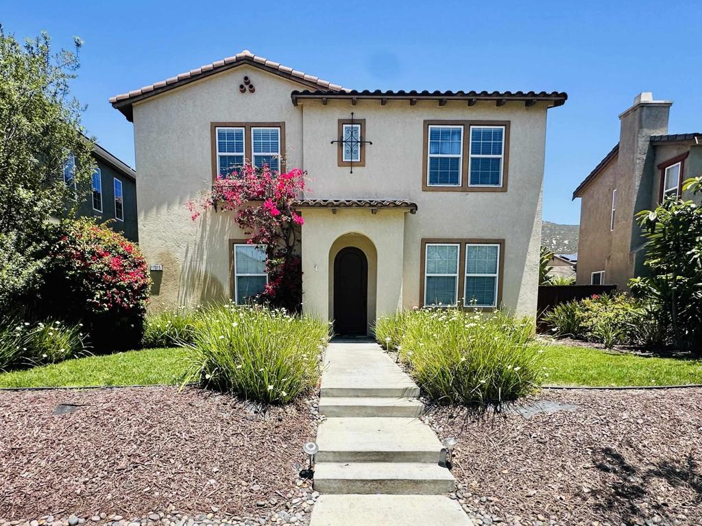 Listing Price $1,899,000-$1,999,000. Welcome to this beautifully updated and meticulously maintained 5-bedroom, 4.5-bathroom home located in one of the most sought-after communities. The well-designed floor plan offers a full bedroom and bathroom on the main level—perfect for guests or multi-generational living—plus a convenient powder room. The expansive open-concept great room flows seamlessly into a gourmet kitchen, featuring a huge center island, abundant cabinetry, stainless steel appliances, and a butler’s pantry with countertop space. Freshly painted interiors and rich wood flooring throughout complement the designer light fixtures, creating a warm and elegant ambiance. Retreat upstairs to the generously sized primary suite, complete with a large walk-in closet and a luxurious ensuite bath featuring dual vanities, a soaking tub, and a walk-in shower. Upstairs, the guest bedrooms are spacious and comfortable, with one featuring an attached private bathroom, providing additional convenience and privacy for family or visitors. Enjoy great curb appeal with low-maintenance, drought-tolerant landscaping, and a 3-car garage with durable epoxy flooring. Additional modern upgrades include a tankless water heater for energy-efficient living. This home also offers exceptional convenience with nearby amenities including popular restaurants, grocery stores, shopping, gyms, libraries, and numerous parks—providing everything you need just minutes from your doorstep. Perfectly situated within walking distance to Monterey Elementary School and zoned for Poway Unified Schools