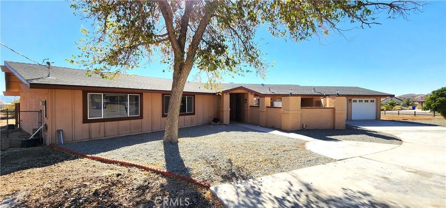 Prime location in Apple Valley!

Beautifully remodeled 2,293 sq. ft. home offering 3 spacious bedrooms and 2 elegant bathrooms. Freshly painted inside and out, featuring waterproof vinyl flooring throughout and an open, light-filled floor plan that creates a warm and welcoming atmosphere.

The family room includes a gas fireplace, while the living room features a wood-burning fireplace — perfect for cozy gatherings during the holidays. The kitchen showcases modern cabinets, stylish faucets, and sleek quartz countertops.

The primary suite offers a generous bathroom with dual sinks and an oversized shower adorned with tasteful finishes.

A move-in ready home located in one of the most desirable areas of Apple Valley — combining comfort, style, and functionality!