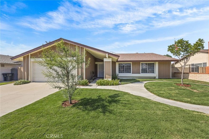 *WOW*  Discover this inviting 3 bedroom, 2 bath single-family home located in a quiet, established neighborhood in Orange. From the moment you step inside, you’ll appreciate the thoughtful updates and move-in ready condition. The home features fresh interior paint and new baseboards throughout and newly remodeled bathrooms with stylish finishes, offering a modern touch while maintaining comfort and charm.   The spacious living area with a cozy fireplace is filled with natural light, creating a warm and welcoming atmosphere for family gatherings or entertaining friends, with sliding door access to the covered patio.   The bright, spacious kitchen with stainless appliances, lots of cabinetry and granite countertops opens to the dining space, making mealtime a breeze.  Custom built-ins are an added bonus.   Three well-sized bedrooms provide flexibility for family, guests, or a home office. The primary suite includes its own upgraded bath with wide doorway and walk-in shower.    Outside, enjoy the peaceful surroundings of this quiet neighborhood, with a backyard that’s perfect for relaxing, gardening, or summer barbecues.  The property features a 2 car direct access garage with ramp and ample driveway.   Conveniently located near shopping, dining, top-rated schools, and easy freeway access, this home combines comfort, style, and practicality in one desirable package.  Don’t miss the chance to own this beautifully updated home in one of Orange’s most sought-after communities!