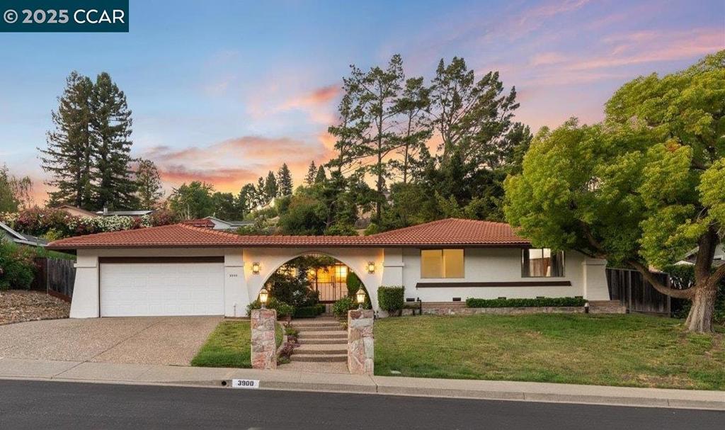 Welcome to 3900 Campolindo Drive—a spacious 4BD/2.5BA single-level home in the beloved Moraga neighborhood of Campolindo. With ±2,340 sq ft of light-filled living space on a 0.27-acre lot, this Spanish-style home boasts standout curb appeal, an arched entry, and vintage charm—offering endless potential to design and tailor it to fit your vision. The layout features a formal living room, dining area, and a kitchen that opens to a cozy den, ideal for entertaining. The spacious primary suite features a private en-suite bath and direct access to the backyard, while three additional bedrooms provide versatile space for family, a home office, or guests. Just a short jaunt to top-rated Campolindo High, the neighborhood Cabana Club, and access to the Lafayette Reservoir, this home is close to downtown Lafayette, Moraga Commons Park, Rheem Elementary, Joaquin Moraga Intermediate, BART, and Hwy 24. The private backyard is a blank canvas with room to create your dream outdoor oasis. Additional features include a two-car garage, laundry room, central heating, and ample storage. 3900 Campolindo Dr offers a rare opportunity to live in a prime location with a flexible layout, timeless character and ample potential.