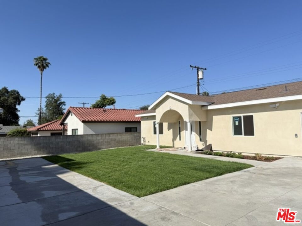 Step into your dream home in this stunning 2025-built 3-bedroom, 2-bathroom residence, ideally located near the breathtaking San Gabriel Mountains. Situated on a spacious 11,000 sq. ft. lot, this property offers unmatched privacy and comfort, with a massive 550 sq. ft. garage and ample parking. This exceptional home is one of two beautifully detached residences on the lot, providing the perfect balance of seclusion and community. The garage is ideal for storage, a workshop, or even a home gym, with convenient laundry hookups and plenty of space. Inside, enjoy modern living with soaring 9-foot ceilings, sleek contemporary design, and a layout perfect for both relaxation and entertaining. The master suite offers a luxurious retreat, complete with a generous walk-in closet. Designed for efficiency, this home features a top-of-the-line Daikin Fit HVAC system, ensuring comfort year-round. Outside, the large front and back yards are perfect for outdoor activities, complemented by two EV charging ports for eco-conscious living. Located in the heart of Azusa, you're just minutes from Citrus College, Azusa Pacific University, Costco, and hiking/biking trails. With easy access to the Metro Gold Line, nearby restaurants, Target, and Azusa Greens Golf Course, convenience is at your doorstep. This move-in-ready home is your perfect retreat. Schedule a tour today! Tenant responsible for utilities. Security deposit not applicable to last month's rent. Minimum lease term 12 months. Pet-friendly.