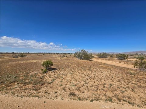 Photo of 0 Poppy Rd 0438-173-05, Apple Valley, CA 92308 (MLS # HD26085014)