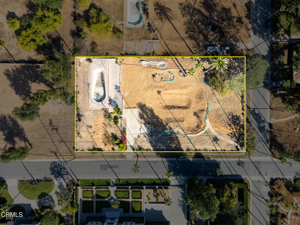 This rare opportunity to own a lot over 36,700 sq ft. to build your dream home in a remarkable area of Altadena in the Country Club neighborhood and above the Altadena Golf Course. This large lot offers a prime residential space, ready for you to rebuild the previous residence of over 4500 sq ft 2 story Spanish or create your dream luxury home. The inground pool was left and emptied out. There are many matured trees that made it through the fires. Enjoy the beautiful views of the San Gabriel Mountains, tranquil skies, and puffy clouds watching the amazing sunrise & sun sets. Opportunities with this property do not come along very often. This is exceptionally rare. Phase 2 debris removal has been completed by the U.S. Army Corps of Engineers.