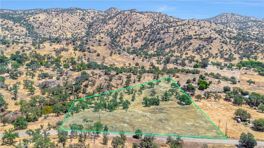 Exceptional opportunity to own an expansive 5-acre parcel in the Bonadelle Sierra Highlands of Squaw Valley. Within close distance from the nearby Country Store, Dunlap Elementary School and Reedley High School! Situated in an area of custom homes, ranches, and small farms, the property is ideal for building your dream home, hobby farm, or retreat. Road frontage on Feather Ln provides easy access, and power and phone service are available nearby (buyer to verify). This gently rolling land offers a mix of open space and mature oaks, creating a private and scenic setting with sweeping foothill and valley views. Just 45 minutes to Fresno and convenient to Kings Canyon and Sequoia National Parks, this is an excellent opportunity to create your own mountain getaway while staying close to the Central Valley. Any parcel icons or outlines depicted in any images are for illustrative purposes only and do not accurately represent property boundaries, dimensions, or legal descriptions and should not be relied upon for any legal, financial, or development decisions.