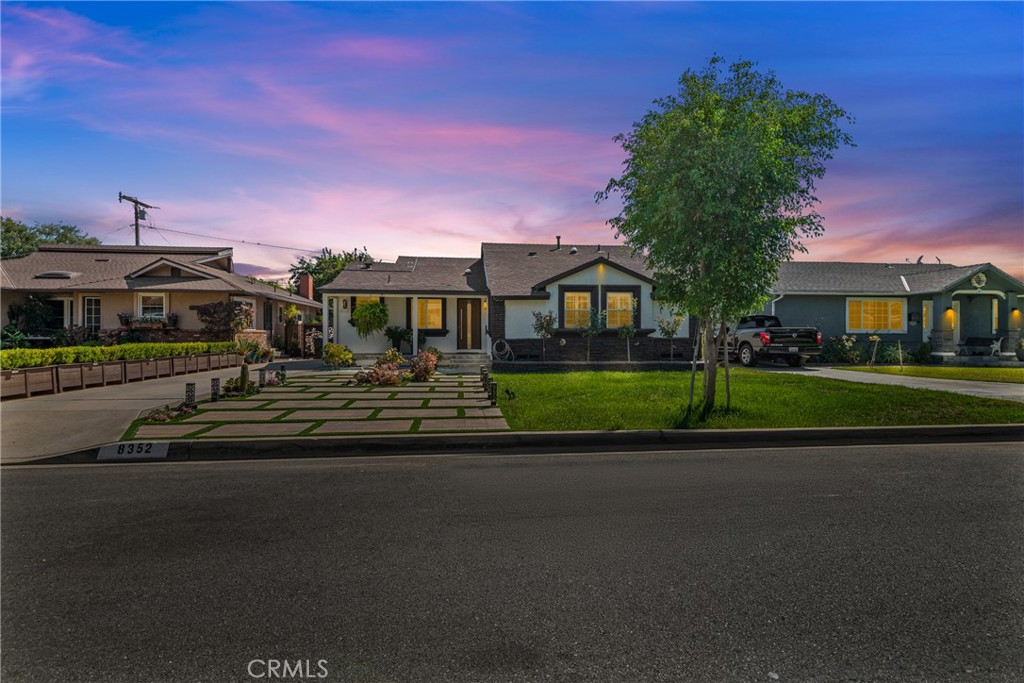 Beautifully updated contemporary smart home located in North East Downey. This fully remodeled property combines modern design with advanced technology, offering convenient control of home features at the touch of a button.
The interior features an open-concept layout with sleek window shutters, new sliding doors, and built-in surround sound in both the main living area and the primary bedroom. The kitchen includes quartz countertops, contemporary cabinetry, and a stylish tile backsplash, designed for both functionality and visual appeal.
The primary suite includes an electric fireplace and a thoughtfully designed en suite bathroom with a Jacuzzi tub, rainfall showerheads, dual sinks, and smart toilets with warming and control features.
Additional enhancements include smart home integration, a new air conditioning unit, energy-efficient fixtures, a water filtration system, and a tankless water heater. The exterior has been freshly painted and features a solar panel system to support energy efficiency.
The backyard offers a built-in fountain and a modern deck, creating a versatile space suitable for relaxation or entertaining. Professionally landscaped with an irrigation system for easy maintenance.
This home offers a blend of updated features and thoughtful design in a well-established area of Downey.