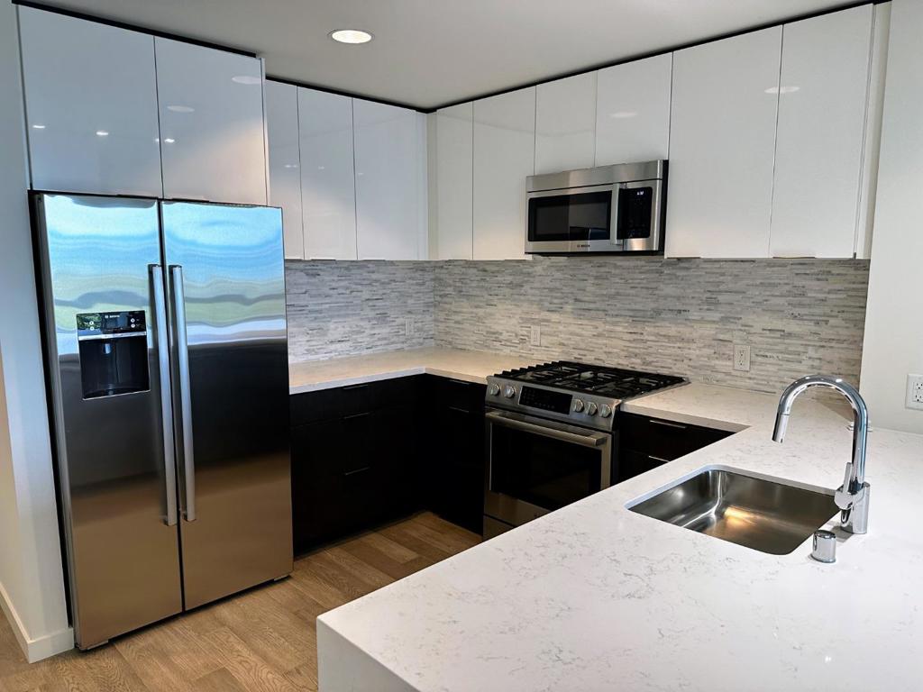 Brand new 2 bedroom, 2 bath modern and stylish condo is in a part of The SF Shipyard's Luxury Collection. It provides a comfortable living space with a total area of 1,067 square feet. One of the main features of this home is that it faces Bay Bridge and the waterfront, and you get to enjoy amazing views throughout the day and night. In addition, large windows offer natural light into the home which includes an expansive kitchen featuring quartz countertops, and modern cabinetry, complete with a full complement of SS Bosch appliances including a refrigerator, washer/dryer range, dishwasher, and microwave. This home also has upgraded engineered hardwood flooring, full Home Automation infrastructure, dimmers, and Honeywell Lyric Thermostat. Another huge benefit is a dedicated parking space assigned to this unit in the secure garage. This unit has smart central heating and air conditioning and the owner pays for water, sewer, gas, and garbage.
