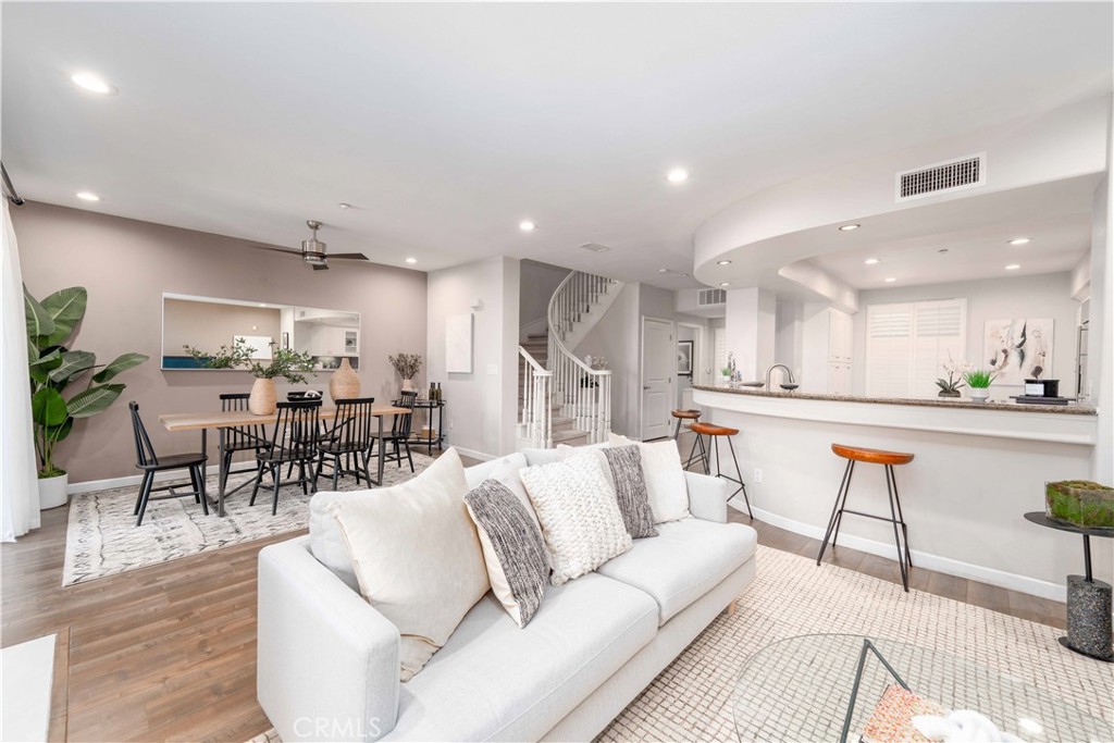 Introducing an Exceptional Opportunity at the Highly Sought-After Serenade in Playa Vista. Step into luxury with this pristine, resort-style 2-story condo perfectly designed for modern living. This immaculate home boasts 2 spacious primary suites, 3 bathrooms, and a chef-inspired kitchen with designer tiles, custom cabinetry, and GE Monogram & Profile appliances, marble countertops, and a sleek curved breakfast bar. The expansive living spaces are highlighted by designer laminate flooring throughout the main areas, and natural light pours in through floor-to-ceiling windows. The living room offers a cozy gas fireplace and a private outdoor terrace perfect for enjoying a morning coffee or evening cocktail. Upstairs, discover two luxurious primary suites, including one with custom designer floors, a walk-in closet, and private balcony access. The master bath offers a large Jacuzzi-style tub, separate rain shower with waterpik massage head, and frameless mirrored medicine cabinets. The home also features dual-zone A/C, Nest thermostats, a GE alarm system with motion detectors, and Wi-Fi-controlled LED lighting. This unit includes 3 reserved parking spaces and one Dedicated Tesla brand wall Charger (For any EV). HOA covers cable, ultra-high-speed internet, water, and trash. Enjoy access to exceptional amenities like the Playa Vista Centerpointe Club with Olympic-sized pools, a 24-hour gym, and movie theater. The community also features a variety of recreational facilities within walking distance, including a baseball court, basketball court, tennis courts, 2 soccer fields, 4 swimming pools, 4 jacuzzi tubs, and a resort-style gym reminiscent of Equinox. Additionally, the Centerpointe Community Center provides office space, workspaces, and a reading area, while the Playa Vista Local Library and dog parks add extra convenience to your lifestyle. Plus, you're just a short walk to Runway at Playa Vista for shopping, dining, and entertainment, and minutes from LAX. Don’t miss out on this perfect blend of luxury and convenience in Silicon Beach!