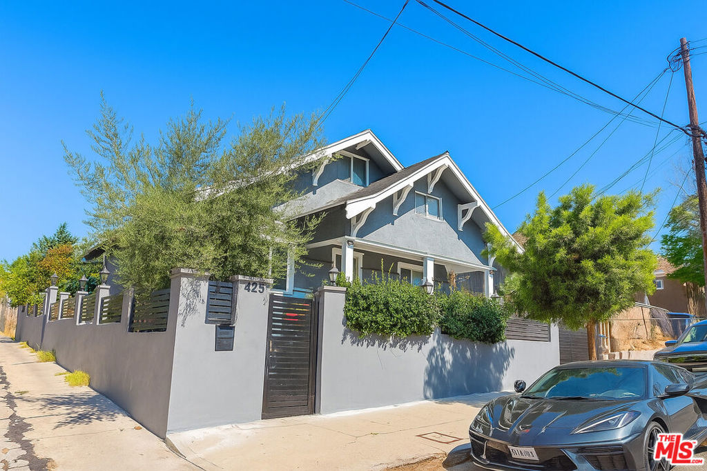 Welcome to 425 Cornwell St, a fully remodeled 4-bedroom, 3-bathroom home in the heart of Boyle Heights. This residence showcases hardwood flooring throughout, a spacious open floor plan, and a modern kitchen with stainless steel appliances. One of the bedrooms and bathrooms includes a private entrance, making it an excellent option for guests, extended family, or potential rental income. The property also includes a spacious detached garage that has been converted into a one-bedroom, one-bathroom unit, featuring windows, a closet, a small kitchen, and tiled or hardwood flooring. Please note, this conversion was completed without permits. Title records reflect approximately 990 square feet; however, the property offers closer to 1,400 square feet in total, including the attic space that has been converted into additional living area. Recent upgrades include new fencing with a secure gated entry, copper plumbing, a 200-amp electrical panel, and a roof in excellent condition. The home is also equipped with heating and air conditioning for year-round comfort, along with two washer/dryer units for added convenience. Ideally located just five minutes from USC Medical Center, schools, and nearby hospitals, this property provides easy access to freeways, Downtown LA, and surrounding communities. Thoughtfully upgraded and move-in ready, this home is the perfect blend of comfort and versatility in a thriving neighborhood.