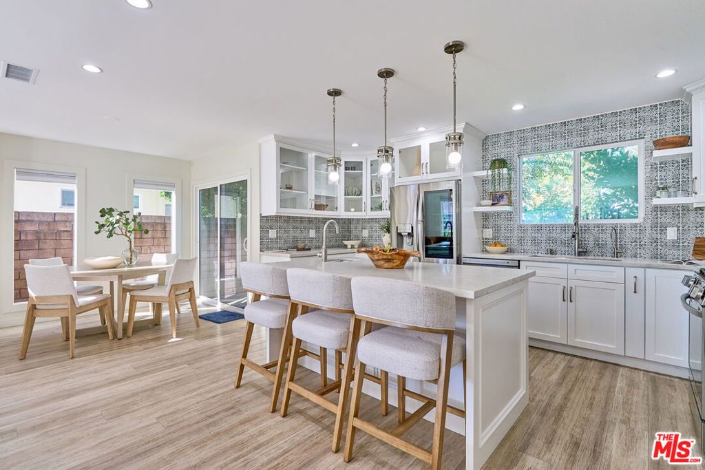 Photo of 4211 W Woodland Avenue, Burbank, CA 91505 (MLS # 25629991)