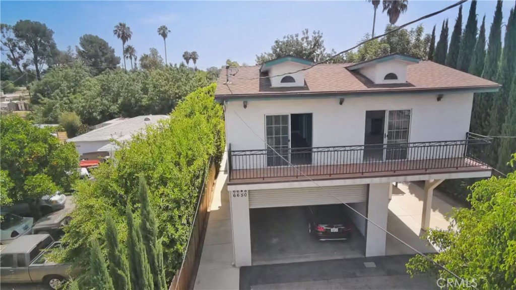 Great opportunity in Lake Balboa for large family or rental income. Main home is 2 - bedroom and 1 - bathroom, non-conforming unit is 1 - bedroom and 1 - bathroom, ADU is 1 - bedroom and 1.5 - bathroom. All separate entrances Large Work Shop, Large Garage. MUST SEE!