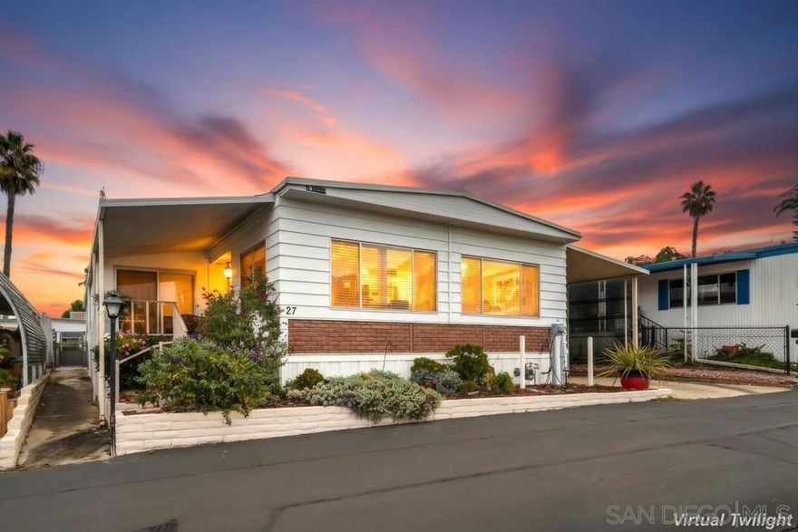 Located in the desirable 55+ community of Villa Novia, this double-wide home offers comfort, convenience, and a vibrant lifestyle at the base of scenic Mt. Helix. Featuring 2 bedrooms and 2 bathrooms, this spacious residence has some recent upgrades include new flooring, exterior paint with Coolwalls by Texaco, freshly painted interior and exterior California room walls, a new AC and heating system, new washer and dryer, new water heater, and new microwave. Enjoy refreshed spaces with new blinds in the living room, master bedroom, and California room, plus refurbished dual sinks in the master bath. Outside, you’ll find a new lantern in the carport, new chain-link fencing with gate, and a new walkway along the side of the home — perfect for easy access and privacy. The Villa Novia community offers a sparkling pool, park, RV parking, and a welcoming community center for social gatherings. Quietly tucked off Chase Avenue in El Cajon, this move-in ready home combines peaceful living with convenient access to shopping, public transportation, dining, and local amenities.