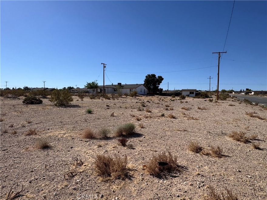 Great lot at the of a Cul-de-sac. Almost an acre of flat land. Utilities are near by. Great location to build your dream home. The lots across the street and to the West are also for sale.