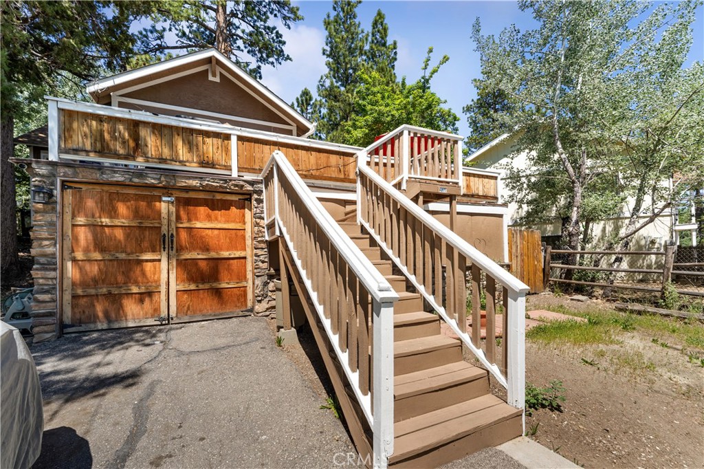 Discover your perfect mountain getaway in this beautifully maintained 3 bed, 2 bath home, located just a short walking distance from the shimmering shores of Big Bear Lake. This residence offers captivating views and a serene ambiance.
The home's thoughtful layout features an open concept living area with large windows that flood the space with natural light and showcase the picturesque surroundings. The chef's kitchen boasts amazing views of the lake while you make use of this culinary space, and comes complete with stainless steel appliances and plenty of cabinetry... perfect for your enjoyment and entertaining. The living room features a cozy fireplace that adds warmth and charm, making it an inviting space for relaxation. Each of the three bedrooms is generously sized, providing comfortable accommodations for family and guests. The two well-appointed bathrooms offer the latest in modern design style and convenience.
Step outside to enjoy the expansive deck, perfect for morning coffee or evening gatherings, all while taking in the tranquil mountain air. The property's location is unparalleled, just a short stroll to downtown Big Bear Lake, where you'll find an array of shopping, dining, and entertainment options. Outdoor enthusiasts will appreciate the proximity to hiking trails, ski resorts, and all the recreational activities that Big Bear has to offer.
Whether you're seeking a full-time residence, a vacation home, or an investment property, this charming mountain retreat delivers on all fronts. Don't miss the opportunity to own a slice of paradise in one of Big Bear Lake's most desirable locations.