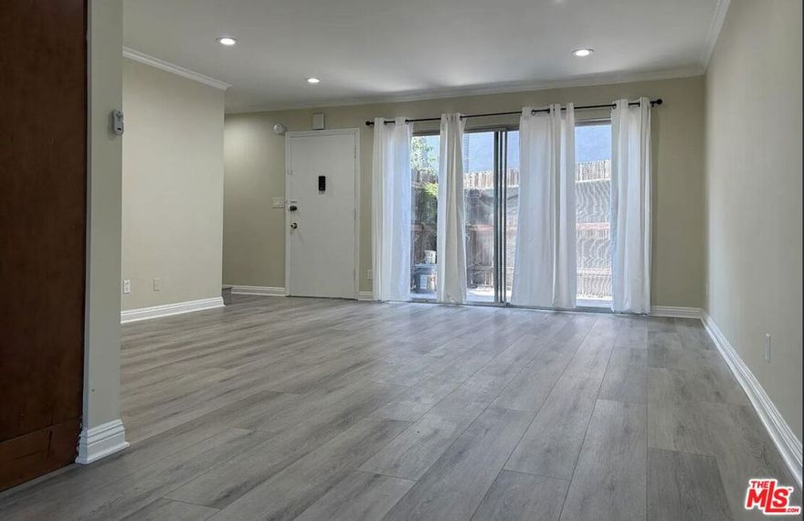 Experience modern city living in this beautifully refreshed 2BR/1.5BA residence nestled in the heart of Koreatown. Bright interiors, contemporary finishes, and an inviting open layout create a perfect blend of comfort and style. The kitchen features granite countertops and ample cabinet space, while the private balcony offers a quiet spot to unwind. Enjoy a gated boutique community with one assigned parking space and water included. Just steps from Wilshire Blvd, Metro Station, and some of LA's best dining and shopping destinations. A rare find that combines convenience, privacy, and urban charm move-in ready!