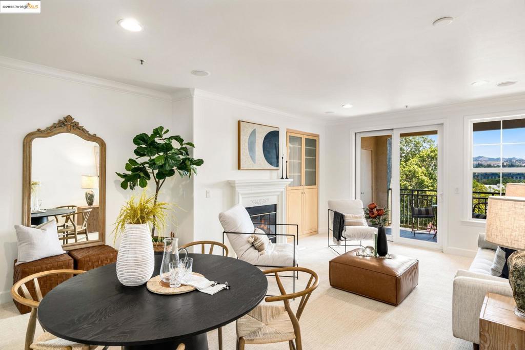Welcome home to the Regent on the Park in Walnut Creek. Where you become a part of a vibrant and lively location in the middle of downtown Walnut Creek, conveniently located near world-class shopping, restaurants & major transportation hubs w/ hwy 680, 24 & BART. This rare and spacious 1 bed, 1 bath + den condo is perfectly situated on the top floor level of this boutique-style community. As you enter, you will be greeted with stunning Mt. Diablo views in the main living area. This light filled home come w/ modern features such as hard floor surfaces, brand new carpeting through out, in-unit laundry along with a spacious den that can serve as an office and/or additional sleeping area. This unit also comes with plenty of storage with built-ins, dedicated storage space & 2 parking spaces in the garage. For an escape, you can access the lush Alma park where you can find yourself relaxing with a cup of coffee, read a good book or just enjoy the calm surrounding. And don’t forget the building amenities such as the fitness center, community & lounge area & pool all in-house! Looking to go out for dining or feel like shopping? Outside your front door you are just moments to shops & restaurants around the Broadway Plaza and Plaza Escuela areas just a few steps away.