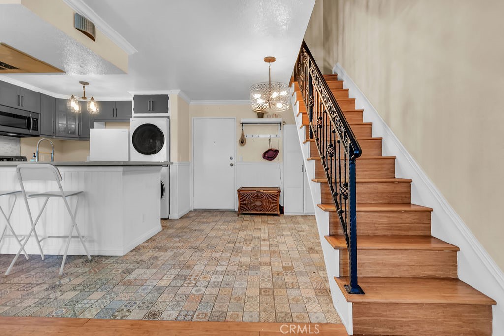 Welcome to one of the best opportunities of 2025! Priced at 2018 levels, this charming 1-bedroom, 1-bathroom condo offers 624 sq. ft. of living space plus an approximately 200 sq. ft. bonus loft. This versatile loft is perfect for a home office, guest room, media space, or whatever your lifestyle calls for.
With nearly 30% more usable space than reflected in the official square footage, this home is arguably one of the best values in the entire Southeast real estate market.
The bright kitchen opens to the living room and features a breakfast bar, built-in microwave, electric range and hookups for a stackable washer/dryer. A cozy nook under the stairs provides an ideal spot for extra storage or a small dining area. The entire unit comes with central heating and A/C and the bedroom as well as bathroom are ready for you to simply bring your bed and move right in!
Situated in a private, gated community, you’ll enjoy amenities including a sparkling pool and spa, BBQ grill stations, and an assigned parking space. Conveniently located near major freeways, shopping, and schools—this home offers comfort, value, and location all in one.
Don’t miss your chance—opportunities like this are rare!
