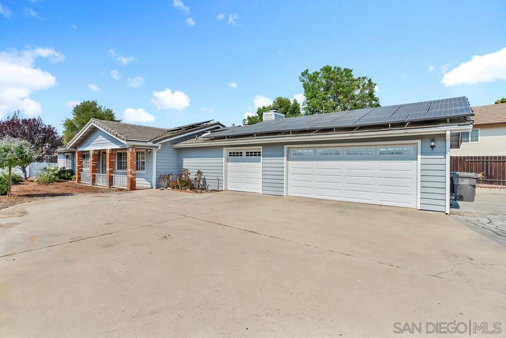 This beautifully maintained 3-bedroom, 2-bath custom POOL home located in the highly sought-after San Diego Country Estates is priced to SELL! Nestled on nearly half an acre, this single-level property offers the perfect blend of comfortable living, privacy, and outdoor amenities. Step inside to an open and functional floor plan filled with upgraded flooring and shutters as well as natural light through out. The spacious kitchen and living areas provide seamless indoor-outdoor flow, ideal for everyday living and entertaining. Outside, enjoy your own private oasis featuring a solar-heated pebble-bottom pool, separate hot tub, patio covers, firepit, and a sports court. RV owners will love the dedicated parking area with a dump station and a well for yard irrigation. The oversized 3-car garage (2+1) is finished with custom cabinets and flooring—perfect for extra storage, hobbies, or a workshop. Enjoy peaceful mornings and stunning mountain views from your own backyard retreat. Located in a quiet corner of SDCE, with access to golf, tennis, hiking trails, parks, and equestrian facilities, this home offers the lifestyle you've been waiting for. Don’t miss this rare opportunity!
