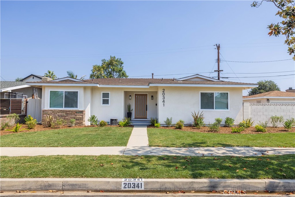 Fully remodeled from top to bottom, this beautifully designed Winnetka home offers modern style, thoughtful upgrades, and a spacious, open-concept layout on a generous 8,305 sq ft lot. With 1,330 sq ft of bright, airy living space, this 3-bedroom, 2-bathroom home blends comfort and elegance in every detail. The seamless open floor plan is perfect for both relaxing and entertaining, featuring recessed lighting throughout and a stunning new kitchen with sleek quartz peninsula countertops, all-new stainless steel appliances, and ample cabinet space. Each bedroom is filled with natural light, including a private primary suite with its own en-suite bathroom for added comfort. Both bathrooms have been tastefully renovated with modern finishes. Major upgrades include NEW central AC, NEW roof, NEW dual-pane windows, and NEW recessed lighting throughout. The beautifully landscaped front and back yards provide plenty of space to enjoy the outdoors, along with potential RV parking and a detached garage with ADU potential. Located on a quiet, tree-lined street in Winnetka, just minutes from Topanga Mall, The Village, Northridge Fashion Center, restaurants, shopping, and schools. Don't miss out on this turnkey home!