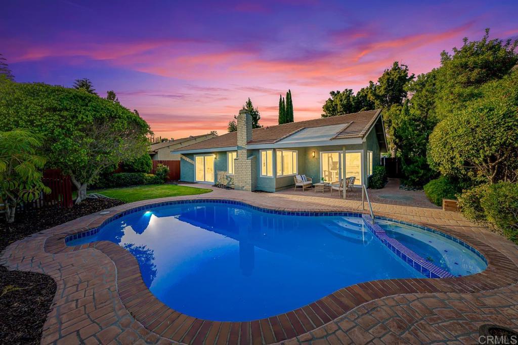 Discover the charm of 10437 Hermanos Road, a fully remodeled single-story home where comfort meets modern style. Designed by Maverick Designs, this 3-bedroom, 2-bath residence offers nearly 1,300 sq. ft. of thoughtfully updated living space filled with natural light. The living room welcomes you with soaring vaulted ceilings, a cozy fireplace, and an airy, open feel that sets the tone for the entire home. The dining area flows effortlessly into the backyard, where a charming brick patio and trellis invite you to dine al fresco or unwind by the sparkling pool in your own private oasis. Inside, every detail has been refreshed for today’s lifestyle, from the sleek finishes to the functional layout. The spacious primary suite offers a serene retreat, while two additional bedrooms provide flexibility for guests, a home office, or hobbies. A welcoming front courtyard extends your living space outdoors, and a two-car garage offers convenience and storage. Situated near parks, schools, and shopping, this turnkey home is ready to enjoy from day one