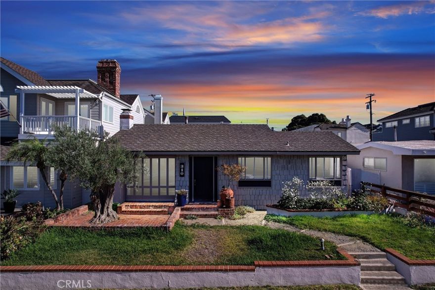 A rare opportunity in the heart of Corona del Mar's Village—310 Marigold Avenue sits on an oversized 5,310 sq ft lot with 45 feet of frontage, and includes approved plans to build a stunning ~ approximately 4,400 sq ft custom home by acclaimed Newport Beach architect Mark Teale.
The existing residence is a well-maintained mid-century gem, offering dual primary suites, a 3-car tandem garage, and excellent location. 
The kitchen features custom African Walnut cabinetry, vintage tile backsplash, and  appliances—perfectly blending timeless charm with modern convenience.