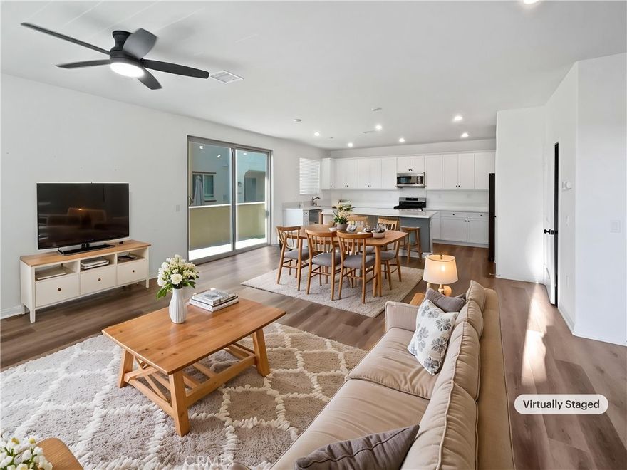 Welcome to your dream home in the sought-after Melrose Heights community of Oceanside, where modern design meets effortless coastal living. This beautifully upgraded residence features an open and inviting floor plan filled with natural light, luxury vinyl plank flooring, and a stunning chef’s kitchen complete with upgraded countertops, a large center island, stainless steel appliances, and elegant lighting. The home is perfect for entertaining or everyday living. The spacious great room flows seamlessly to a private backyard with low-maintenance turf and a covered patio, ideal for outdoor dining and relaxing. Upstairs, the primary suite offers a peaceful retreat with dual vanities, a walk-in shower, a soaking tub, and an expansive walk-in closet. Two additional bedrooms and a versatile loft provide plenty of space for family, guests, or a home office. Energy-efficient upgrades include paid solar, a smart thermostat, EV-ready garage, and tankless water heater. Located just minutes from the beach, shopping, restaurants, and top-rated Vista Unified schools, this home delivers the perfect blend of comfort, convenience, and California style.