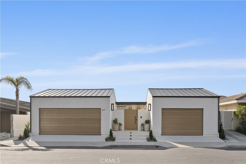 Truly, and outstanding opportunity for a "single level residence" located in the "coveted" 24-hour guard-gated "Oceanfront" community of Niguel Shores… This "furnished" custom residence has been totally renovated in 2024. Renovations and features include all new windows, new roof, center island kitchen with the top-of-the-line Dacor appliances. Six-burner gas range, multiple ovens, stainless steel Dacor refrigerator/freezer, dishwasher and microwave.. All new custom kitchen cabinetry throughout, light oak wood flooring, interior sprinkler system, LED lighting, beautiful, sliding glass doors affording this residence the most incredible Pacific ocean views, as well as Catalina, San Clemente island and Palos Verdes views. Additional features include multiple large screen TVs, built-in wine cooler, master suite containing vaulted ceilings, expansive patio doors system, double vanities, custom cabinetry and multiple closets. There are additional two ensuite bedrooms with beautifully designed bathroom areas. Main floor laundry room inclusive of LG washer and dryer. Ancillary bedrooms also contain wall mounted TVs… dining room table converts to a regulation size pool table … Outstanding bi-fold door system affords this home an incredible indoor outdoor living ambiance with a covered logia, outside barbecue area including appliances, outdoor firepit & multiple large screen TVs… The ocean views from this residence are absolutely breathtaking… The residence also contains a security system, central air conditioning, and a beautiful glass “Dutch door“ for entry and epoxied 3-car garage. This residence has been furnished by restoration hardware and must be seen by your most discerning clientele! This location is within blocks of the Pacific Ocean and offers beach access to the phenomenal surfing breaks of “Salt Creek Beach“ and is walking distance of both the famed Ritz Carlton Resort and Waldorf Astoria!… Minutes away to the acclaimed Dana Point Harbor and Lantern District with its numerous shopping and dining facilities!… the homeowners association of this incredible community offers such amenities as tennis, basketball, pickleball, sand volleyball court, Olympic-size swimming pool, and clubhouse!….. Truly a remarkable opportunity!!