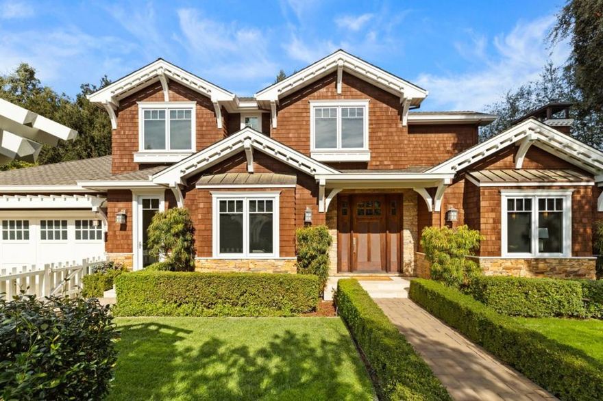 Welcome to 1875 Camino A Los Cerros, a sophisticated Menlo Park home that seamlessly blends elegance and comfort. This stunning residence offers 4 spacious bedrooms, 3.5 bathrooms across 3,358 sqft. Step inside to discover a thoughtfully designed layout - featuring an ensuite bedroom on the main floor, perfect for guests or a home office. Upstairs, you'll find three more large bedrooms, including a generous primary suite complete with a walk-in closet and spa like bathroom. For added convenience, the laundry room is also located on this level. The heart of the home is the gourmet kitchen, equipped with a 6 burner gas Wolf Stove, warming drawer and a large center island with counter seating, ideal for everyday living and entertaining. Nano doors open to a private covered patio, creating a seamless indoor-outdoor living experience. In addition there is an outdoor fireplace, peaceful water feature, built-in BBQ and grass area to play. This home offers the perfect blend of privacy yet ability to walk to shops, restaurants and schools.