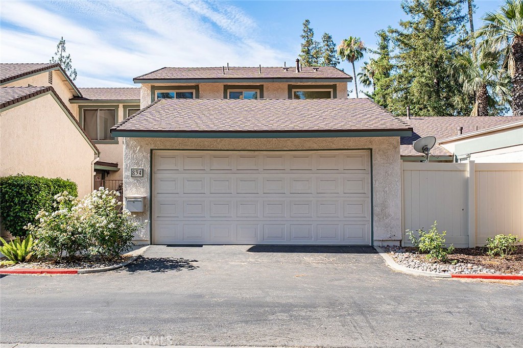 Coming to market for the first time in 50 years, this beautifully maintained 3-bedroom, 2 full-bath, and 1 half-bath condo boasts 1,312 sq ft of thoughtfully designed living space and reflects true pride of ownership, featuring a brand-new roof, newer air conditioning, and dual-pane windows for energy efficiency and comfort. The spacious, versatile layout is ideal for every lifestyle, while the sought-after community offers amenities such as a sparkling pool, picnic area, and multi-sport court for basketball, pickleball, and volleyball. Perfectly positioned near Metrolink, top-rated schools, and prestigious colleges, this prime location blends suburban tranquility with urban convenience, making it a rare opportunity not to be missed.